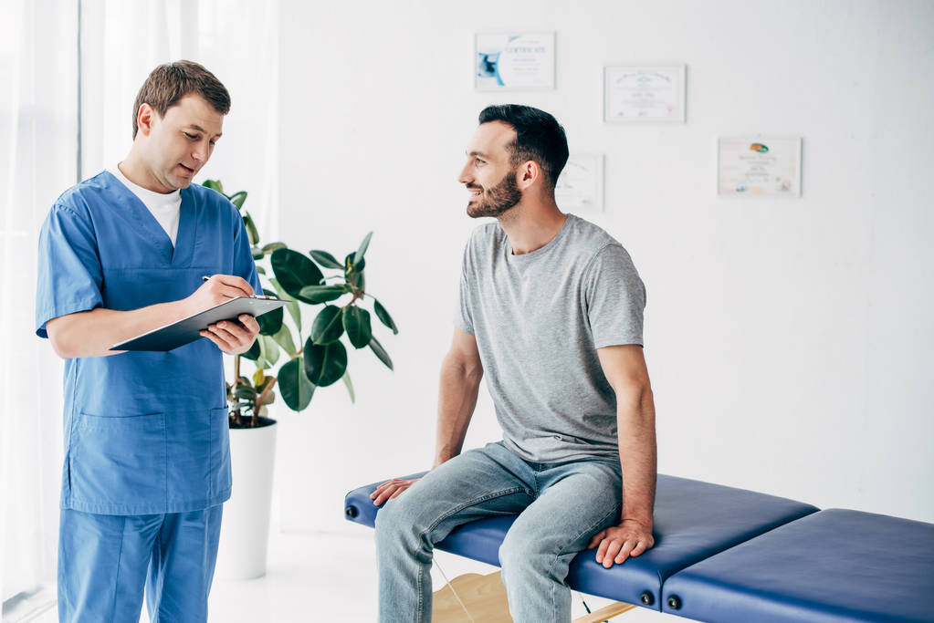 Primary care provider examining a patient